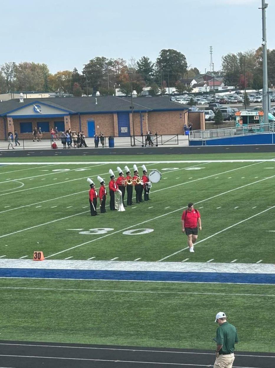 The High School Band getting set up on the field before competition performance at the Open Class D ISSMA Regional. Photo captured by Whitko Band Alumni. 18 October 2025