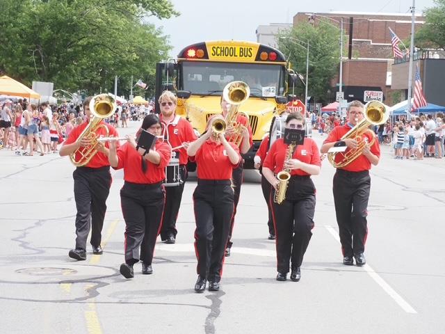 The Edison Band in triangular formation marching down Lincolnway in LaPorte for the parade. Thank you to the Kiwanis Club of LaPorte for this image. 04 July 2025